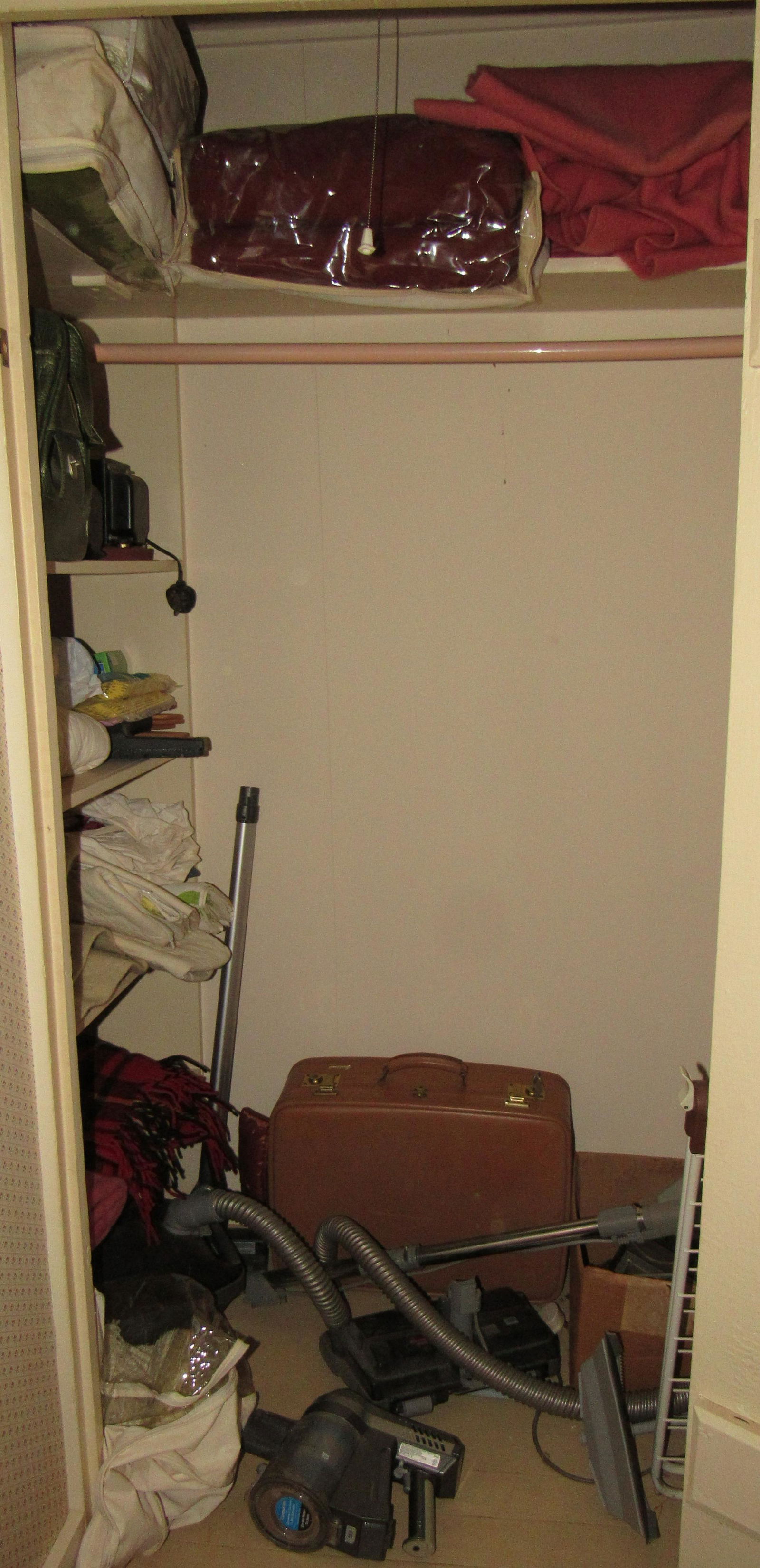 Blankets Vacuums Closet Contents (1 of 8)