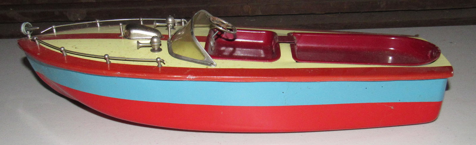 Tin Toy Boat Made in Japan: Approx 6" wide and 16" long