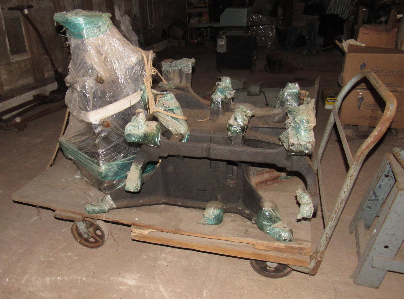 Antique Cast Iron Printing Press Base & Cart: Getting cart and contents. The cast iron base is approx 27" x 38" x 23 3/4" tall.