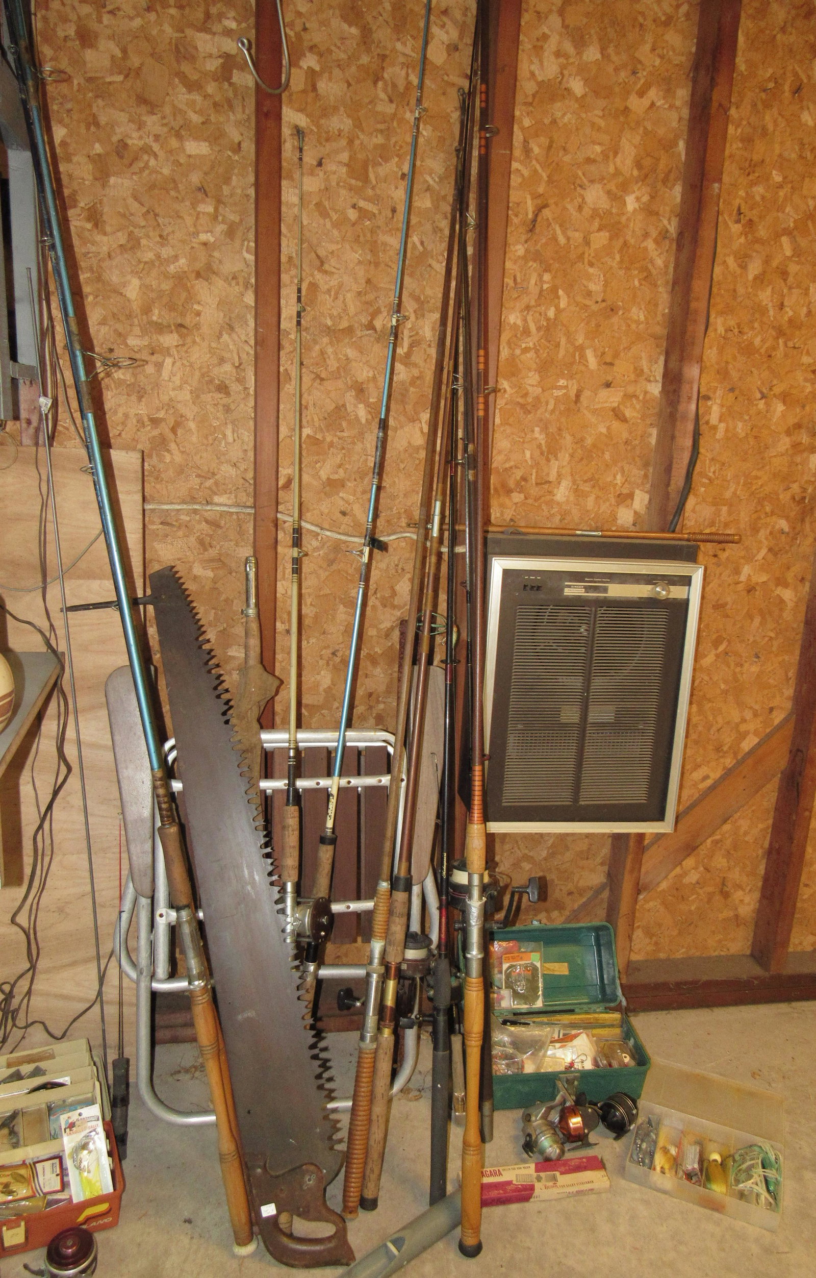 Vintage Fishing Poles Reels Tackles Boxes: Getting all pictured, including saw and chair