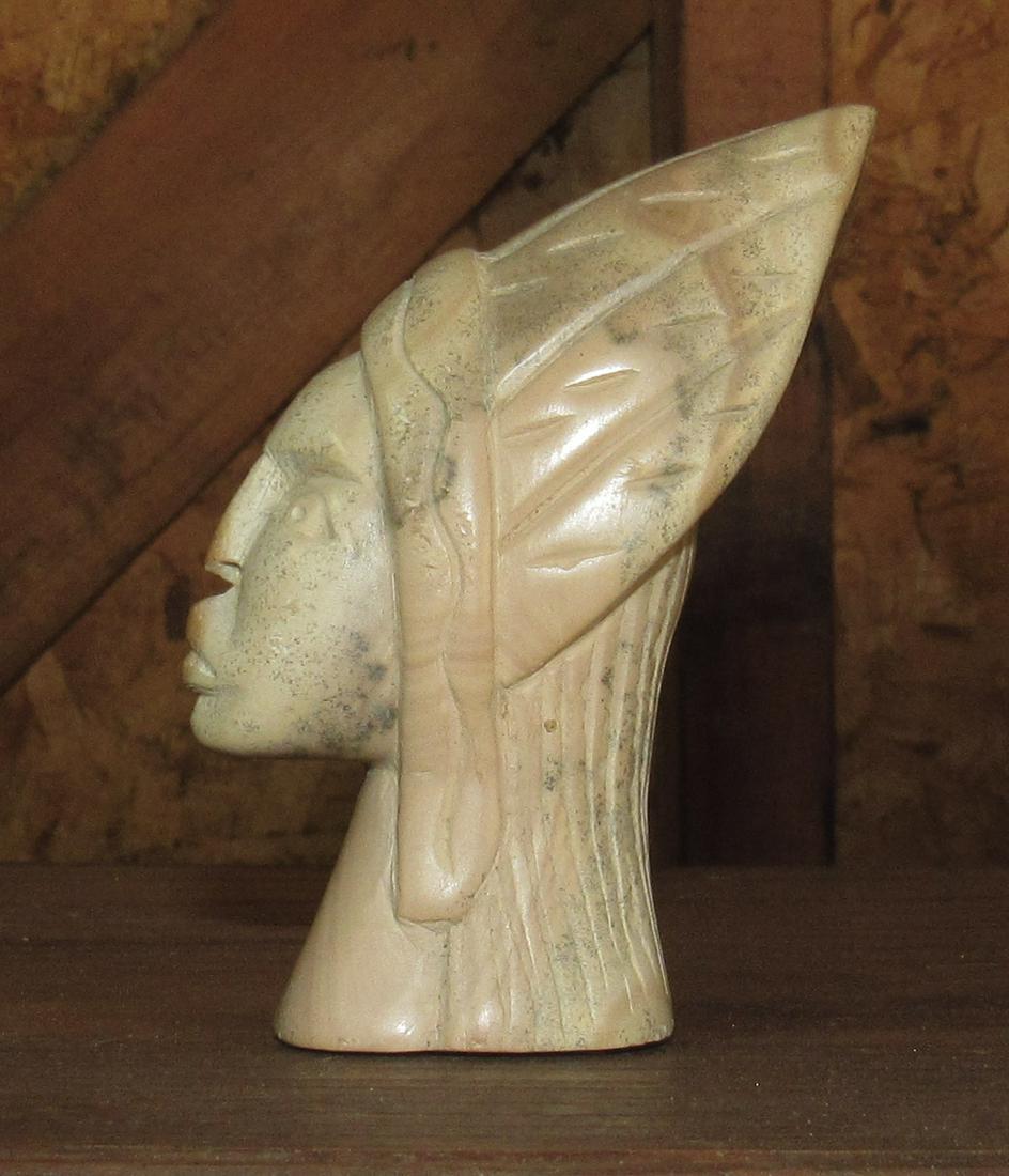 Soapstone indian: Approx 3 1/2" tall. Believed to be soapstone. Sold as pictured