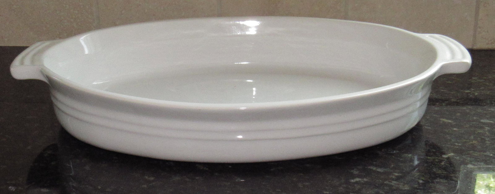 LeCreuset Casserole: Approx 10 1/2" x 16" x 2 1/2" tall
