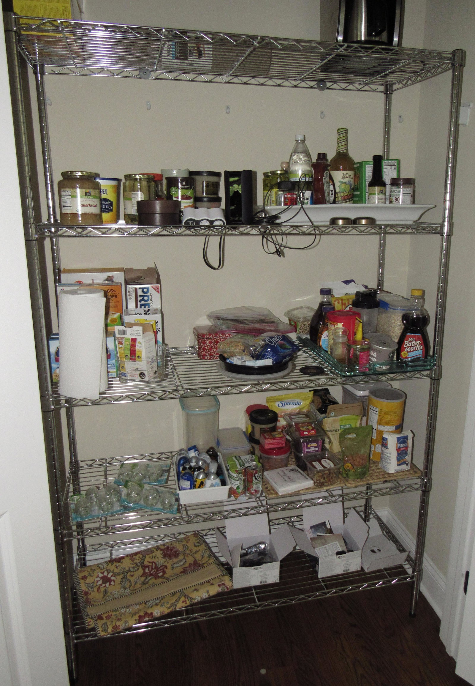 Chrome Wire Shelf with Contents: Shelf is approx 18" x 47" x 75" tall. Includes items on it, EXCEPT THE FOOD. FOOD WILL BE THROWN OUT