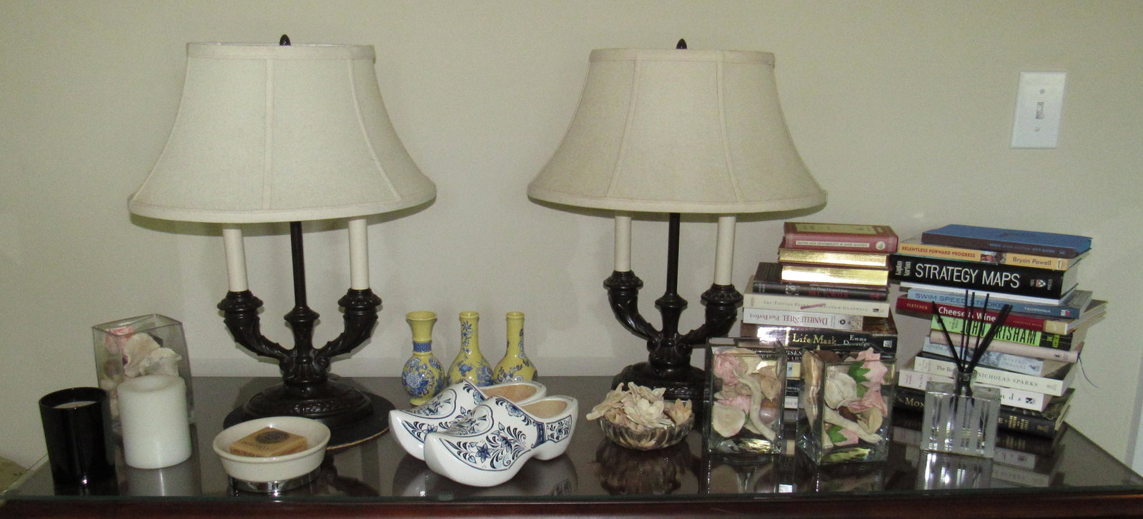 Books Table Lamps Misc Contents: Lot includes all pictured on top of console cabinet
