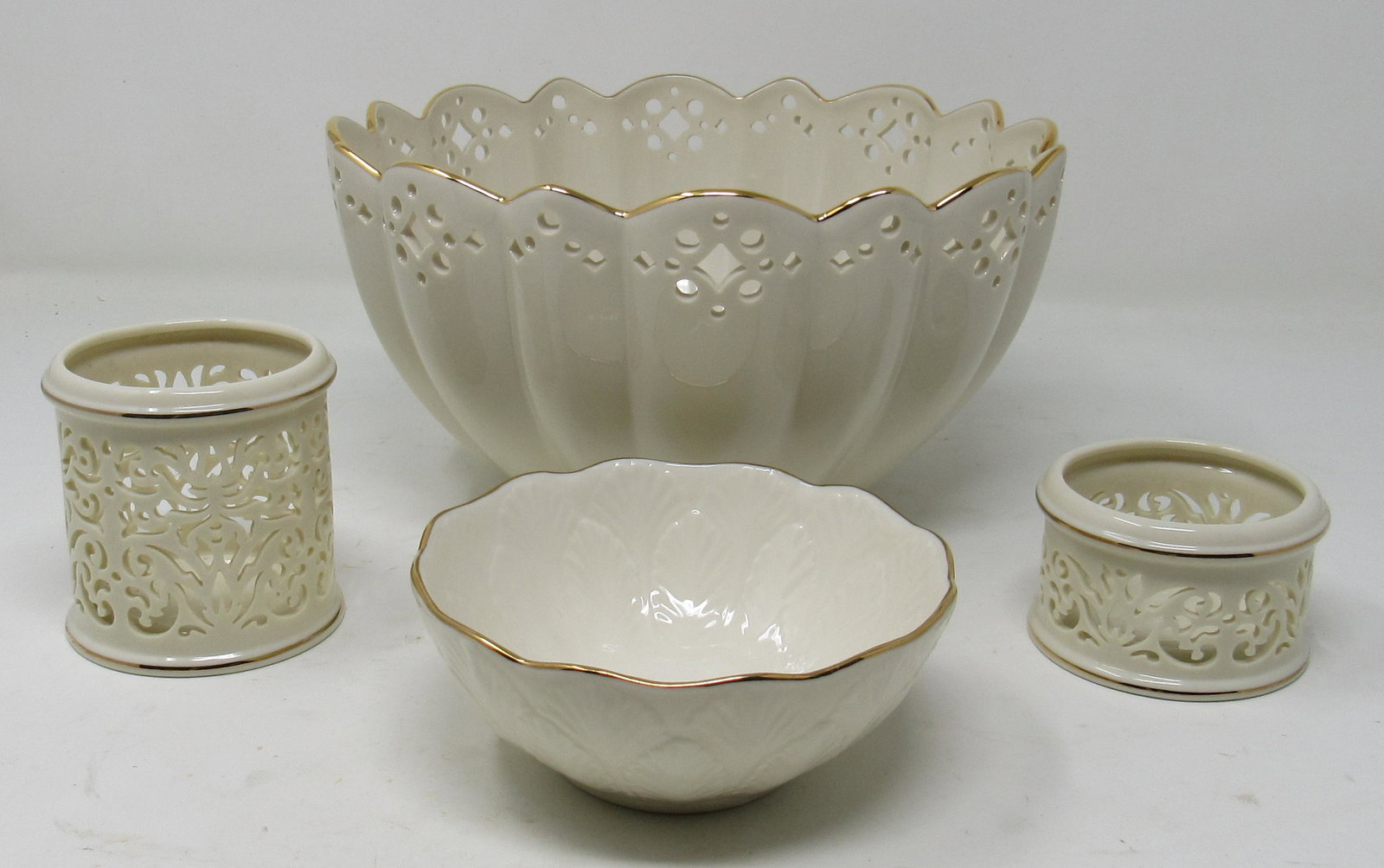 Lenox Bowls and Candle Holders: Large Bowl is Linen and Lace. It is apprx 8 3/4" in diameter and 4 1/2" tall.