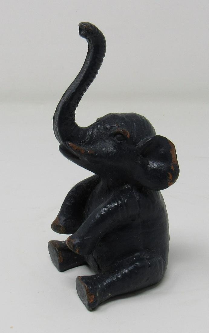 Elephant: Apprx 4 1/2" tall. Might be lead