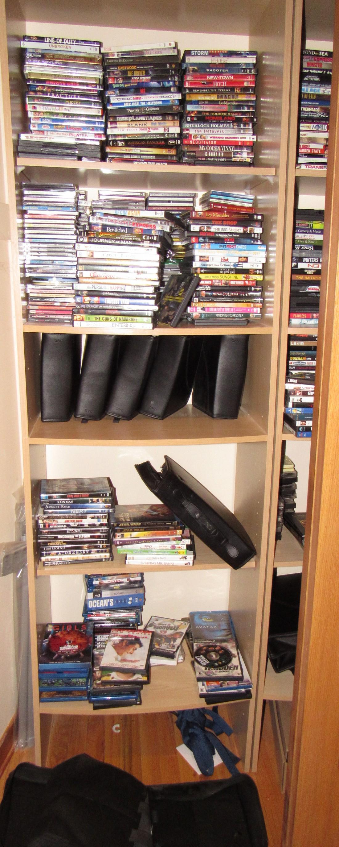 Large Closet Filled with CD's DVD's VHS Tapes Play: Only a couple play station games I noticed. Take what you want and leave the rest