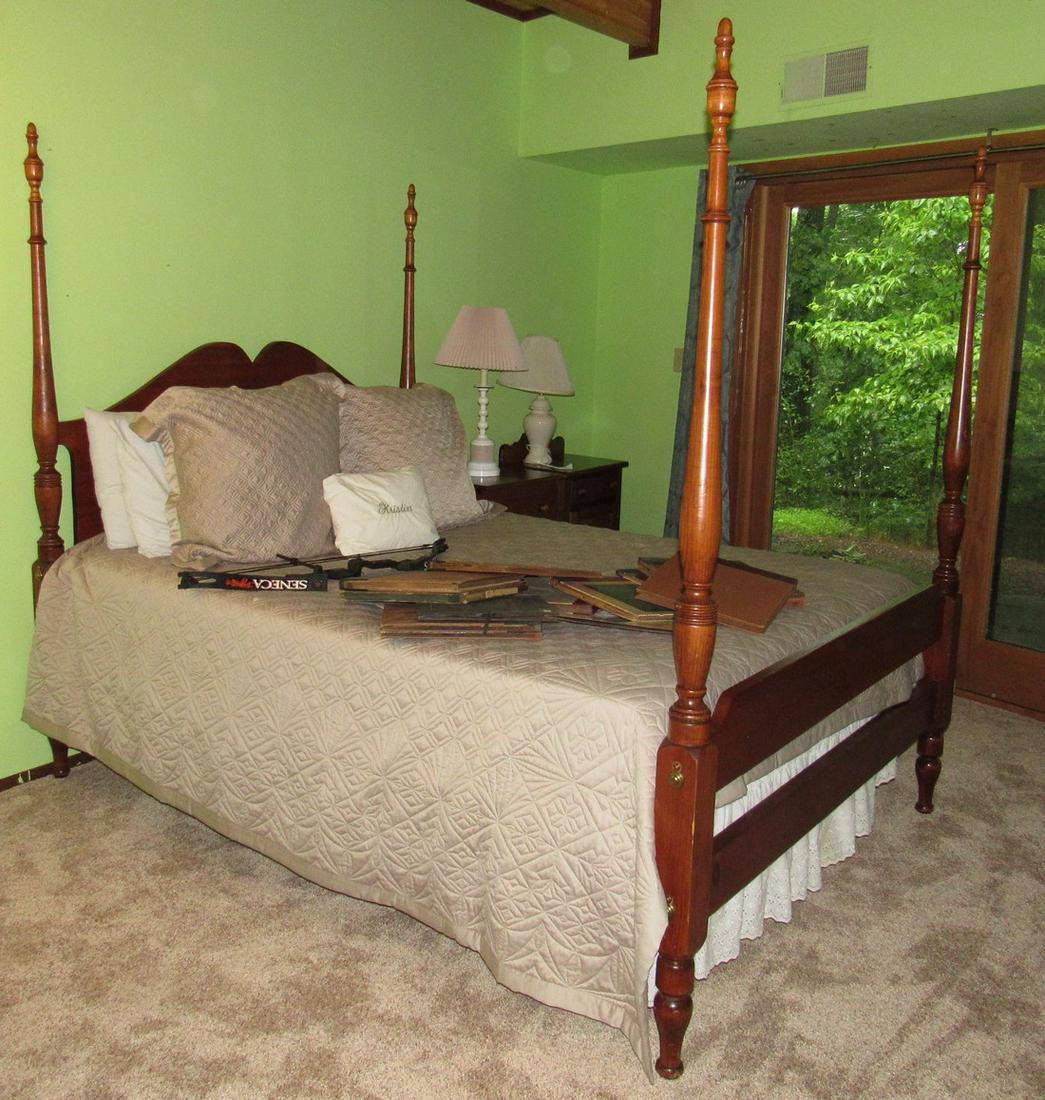 Poster Bed: Looks like a queen. Does not include records and bow on it.