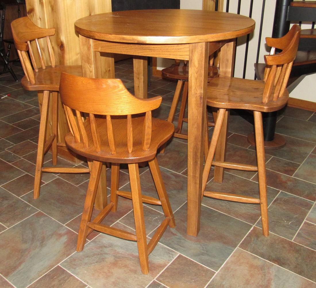 Oak Hunt Furniture Bar Stools and Table: Table is not Hunt. It is made in China. It is apprx 36" in diameter and 42 1/4" tall. Shorter stools are swivel and approx 25" to seat. Taller ones are 29" to seat.