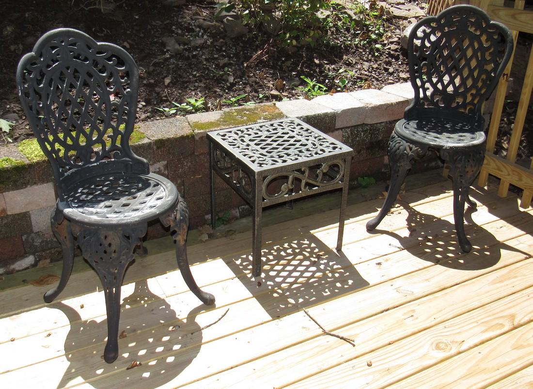 Cast Iron and Aluminum Patio Chairs and Table: Table is approx 17" x 17" x 18 1/2" tall. Chairs are cast iron legs, with cast aluminum backs and seat