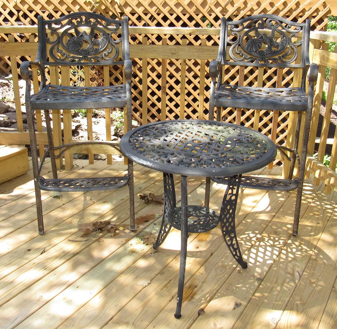 Cast Aluminum Patio Table and Chairs w/ Hummingbirds: Table is apprx 26" in diameter and 27 1/2" tall and all aluminum. Chairs are approx 30 1/2" to seat.