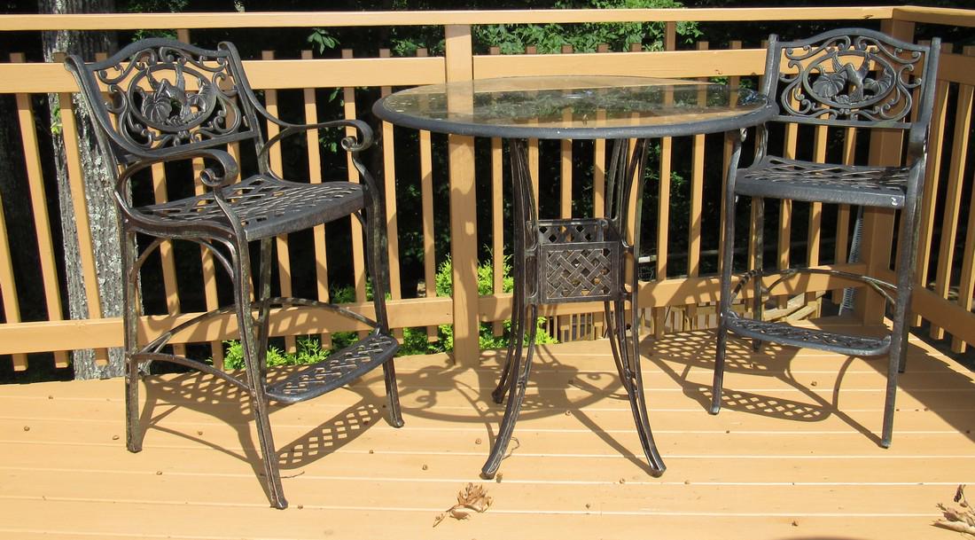 Cast Aluminum Patio Table and Chairs w/ Hummingbirds: Table is approx 41 1/2" in diameter and 41" tall. Chairs are approx 30 1/2" to seat.
