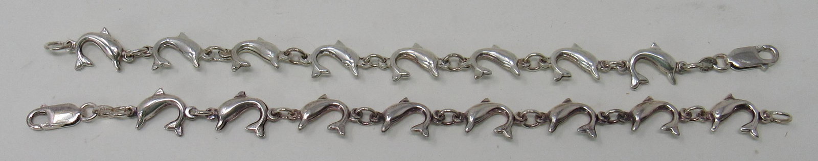 925 Sterling Silver Dolphin Bracelets: Both marked 925 Italy and approx 7 1/8" long