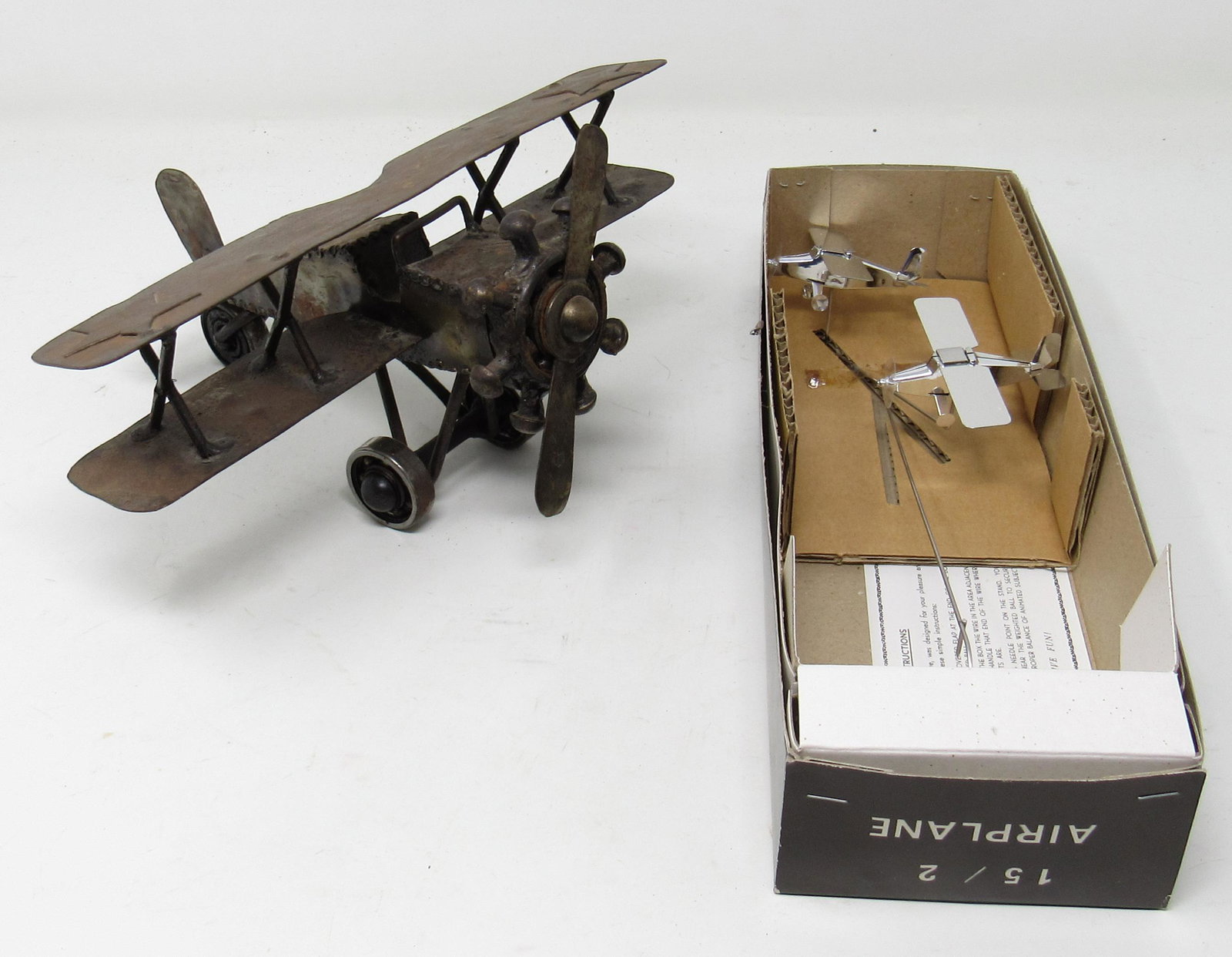 Metal Airplane & Otagiri Kinetic Art: Metal Airplane on left is approx 9 1/4" x 7 1/2" x 4 1/4" tall