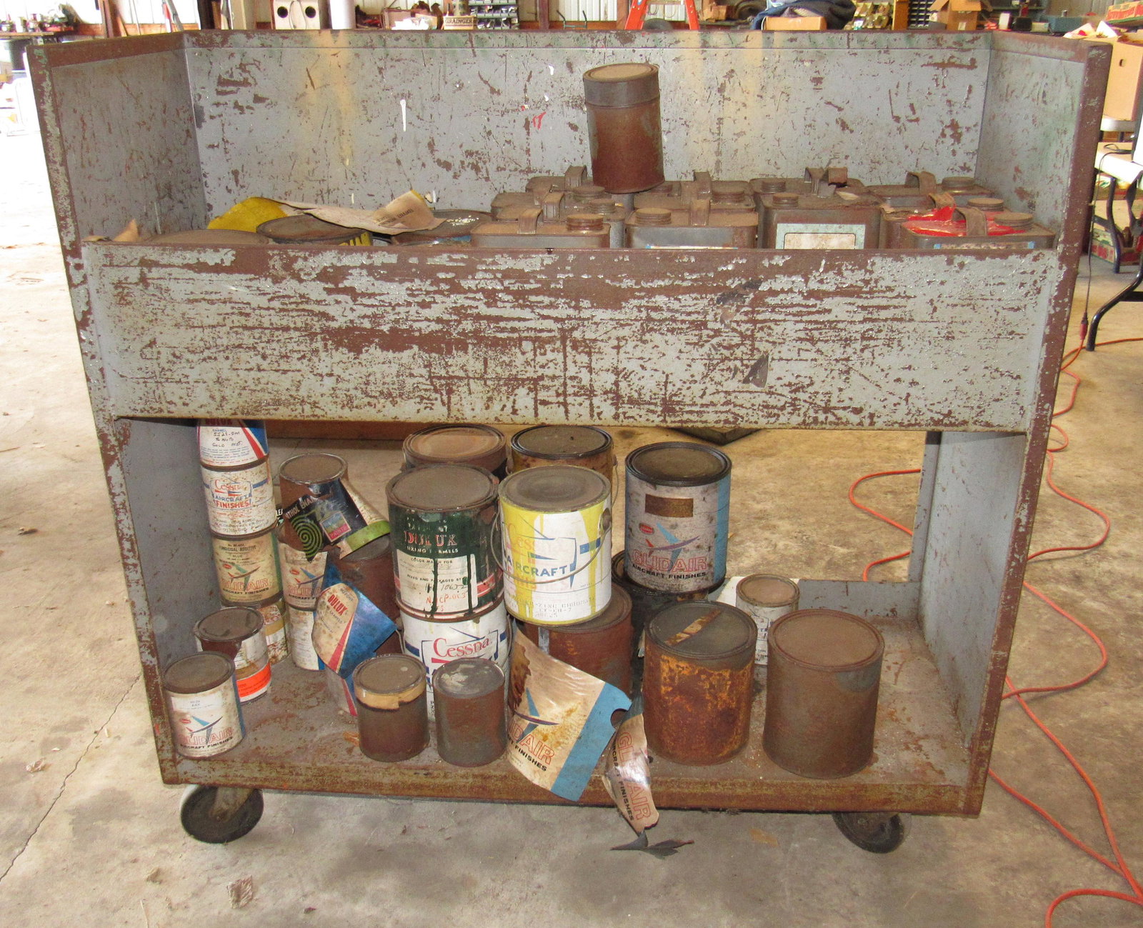 Rolling Metal Shop Cart: Approx 18 1/2" x 48" x 47" tall. Includes paint , if you want it