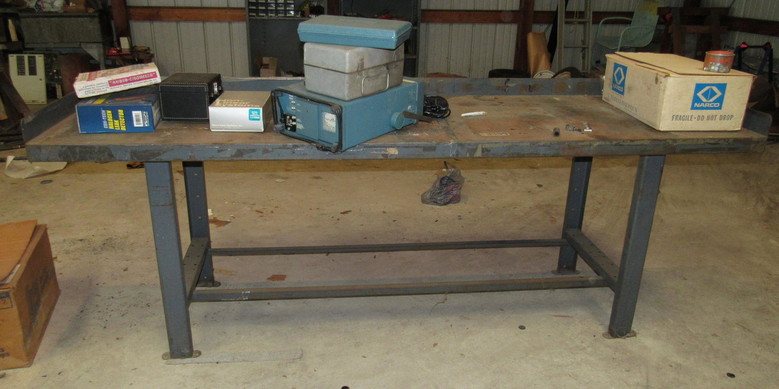 Metal Workbench: Approx 30" x 96" x 37" tall. DOES NOT INCLUDE ITEMS ON IT