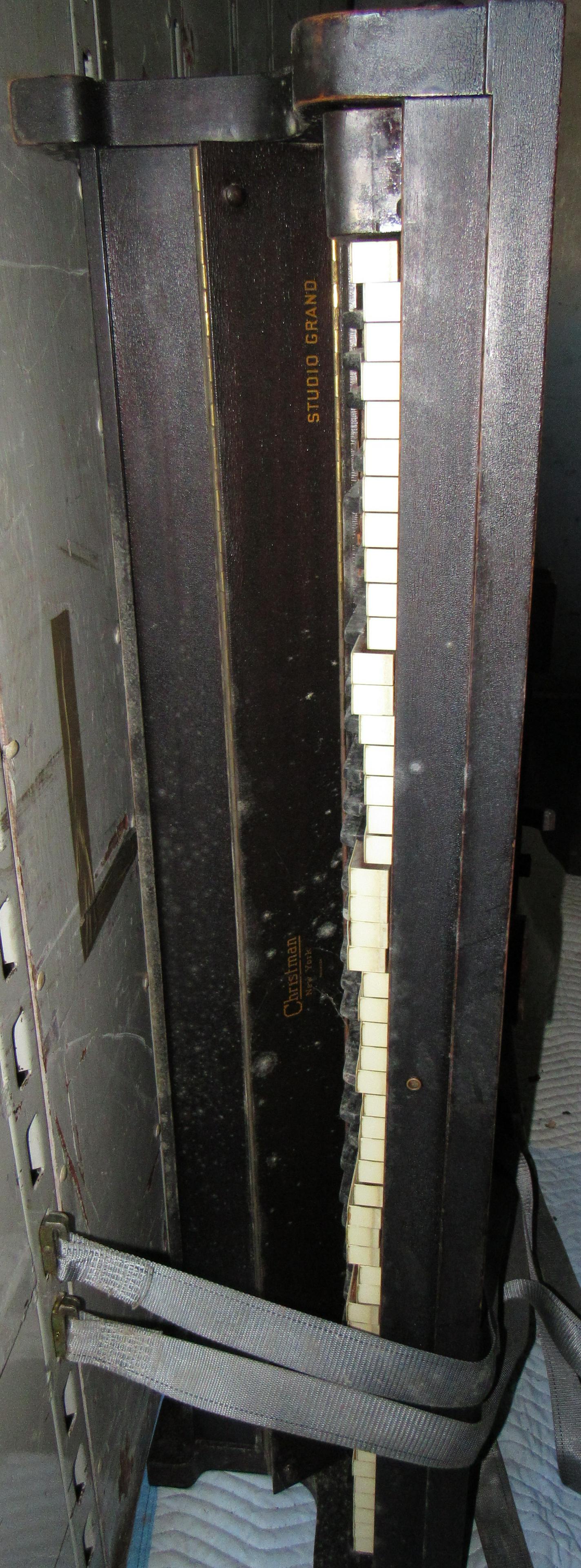 Christman Studio Grand Piano: Approx 57" x 60" . It is loaded in moving trailer. Sold as pictured