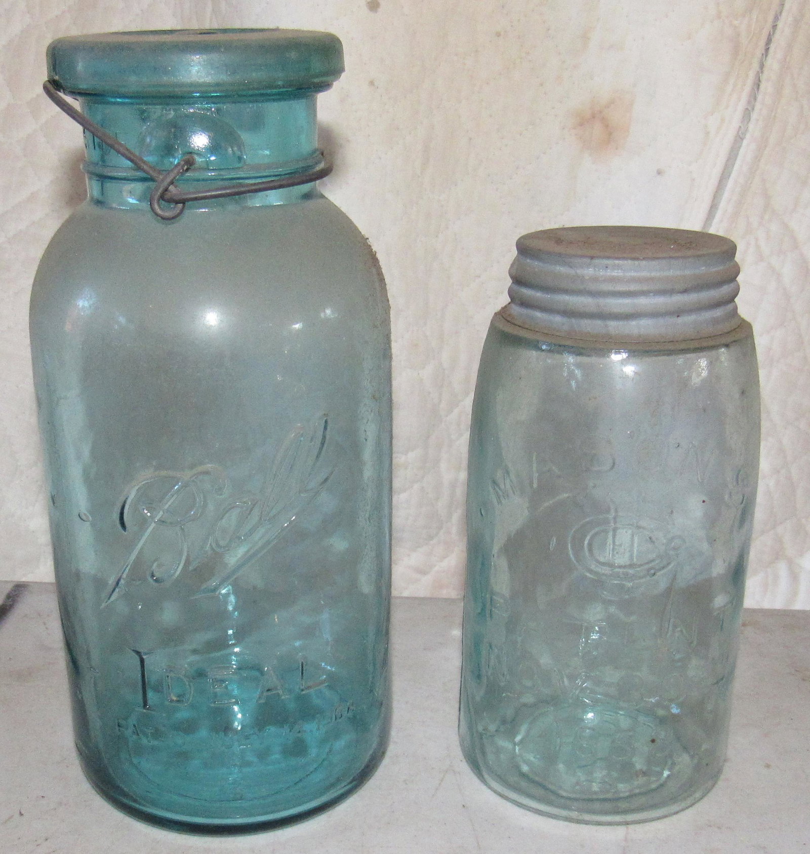 Ball Mason Canning Jars: One on left is approx 10" tall to top of lid. Lid does not fit jar and has a couple chips by locking tabs on bottom.