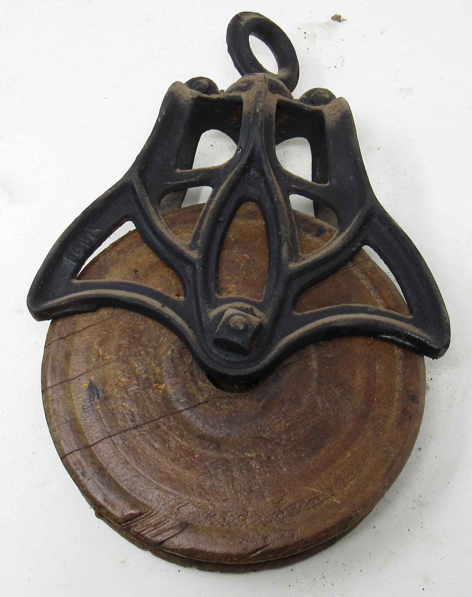 Cast Iron Pulley with Wooden Wheel: Wheel is approx 7" in diameter and total length is apprx 12"