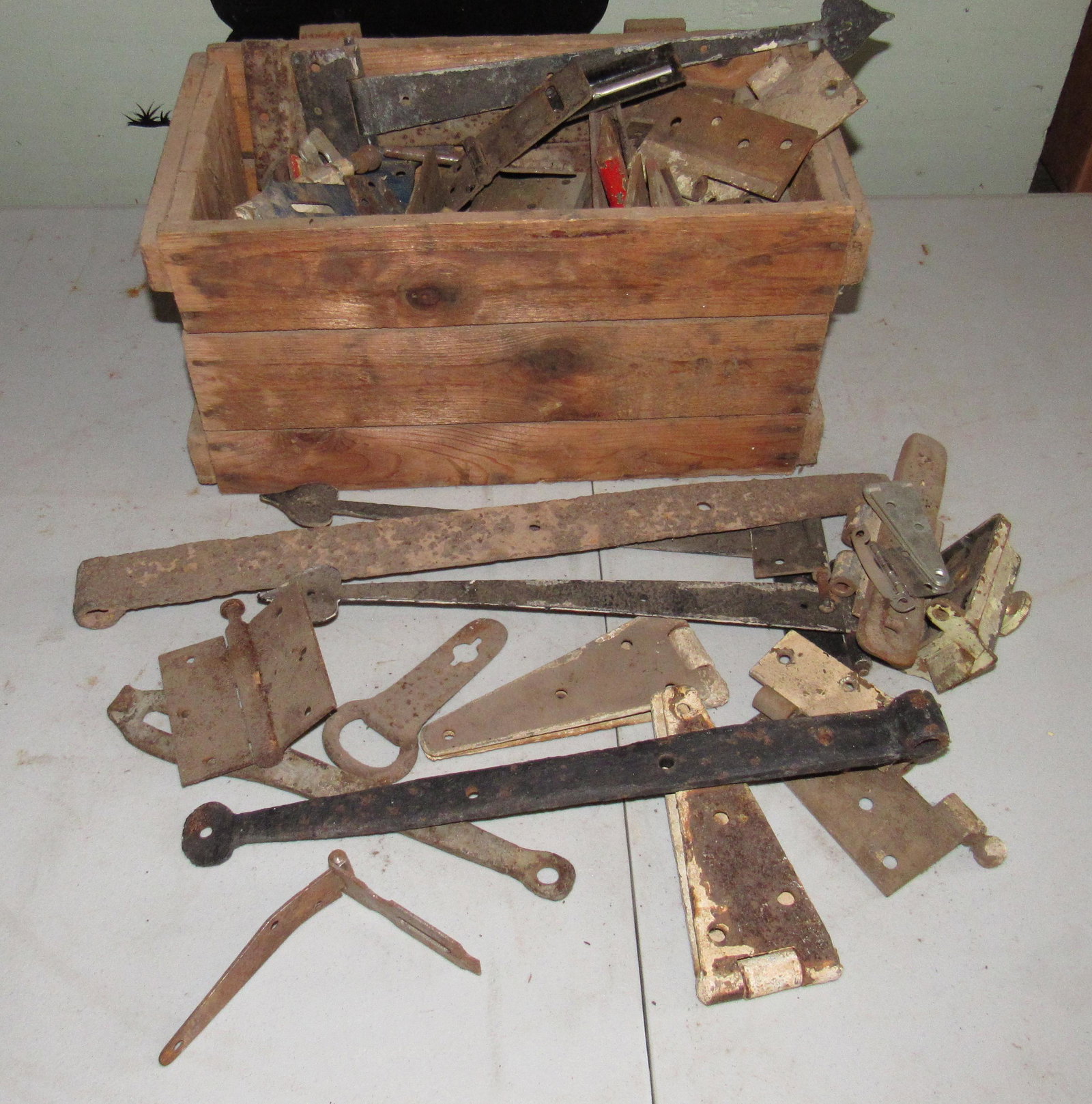 Wood Crate Filled with Hinges & Misc Hardware: Box is approx 8" x 15 1/4" x 8" . It is filled and we did not empty it all out to see what is in it. Looks like mostly hinges. Sold as pictured