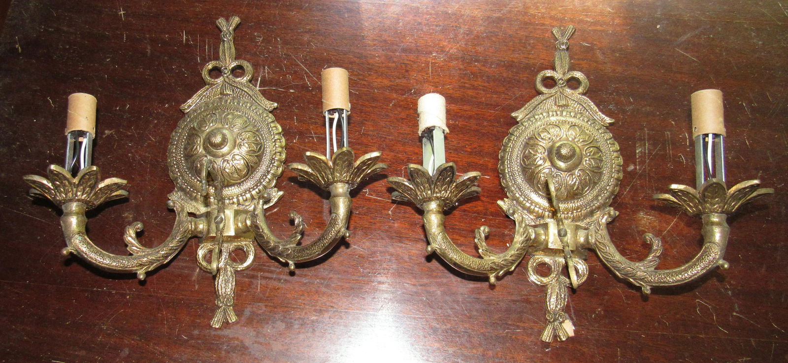 2 Brass Wall Sconces: Approx 10" wide and 10 1/2" tall.