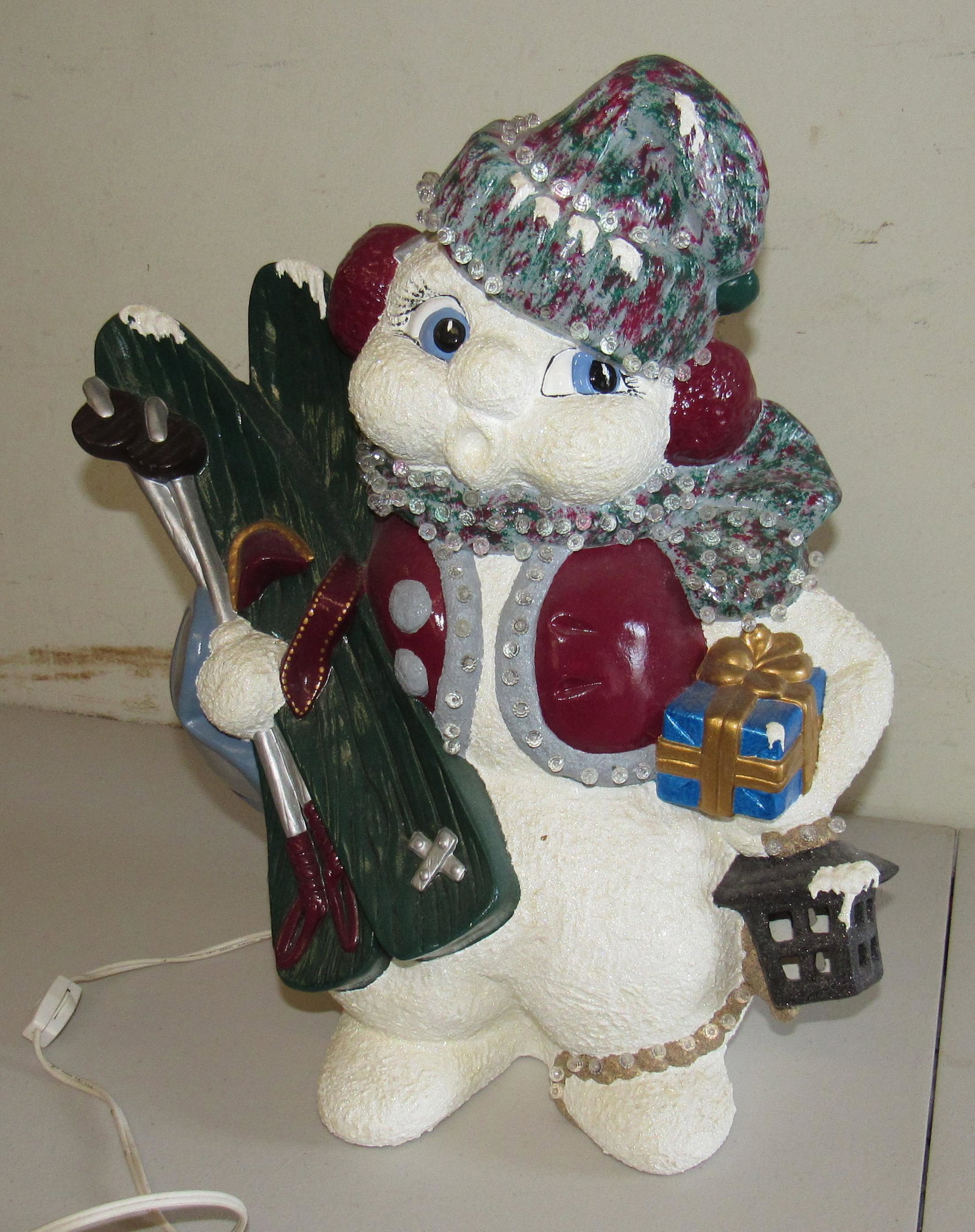Ceramic Skiiing Snowman: Apprx 17 1/2" tall and is lighted