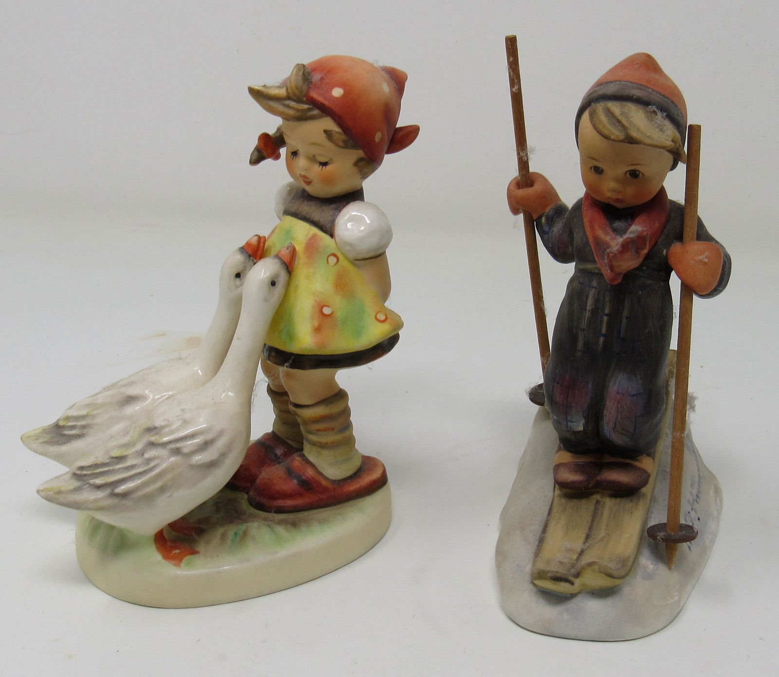 Skier & Girl with Geese Hummel Goebels: Approx 5" tall