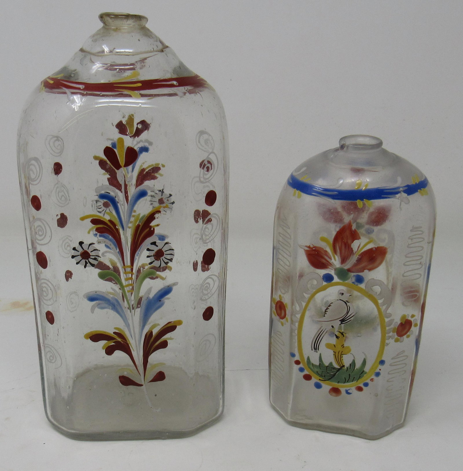 2 Stiegel Style Enamel Painted Glass Bottles: Largest is approx 3" x 3 5/8" x 8" tall.