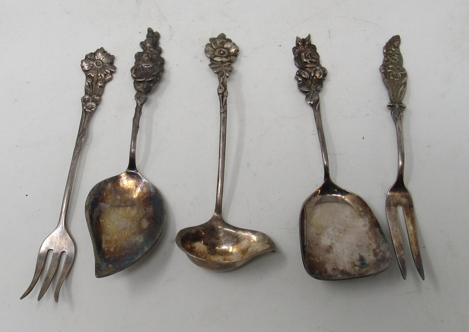 Reed Barton Cocktail Serving Spoons & Forks Sterling ?: Largest is approx 5 1/4" long. They are NOT marked Sterling and we do not guarantee them to be. Total weight is approx 120 grams