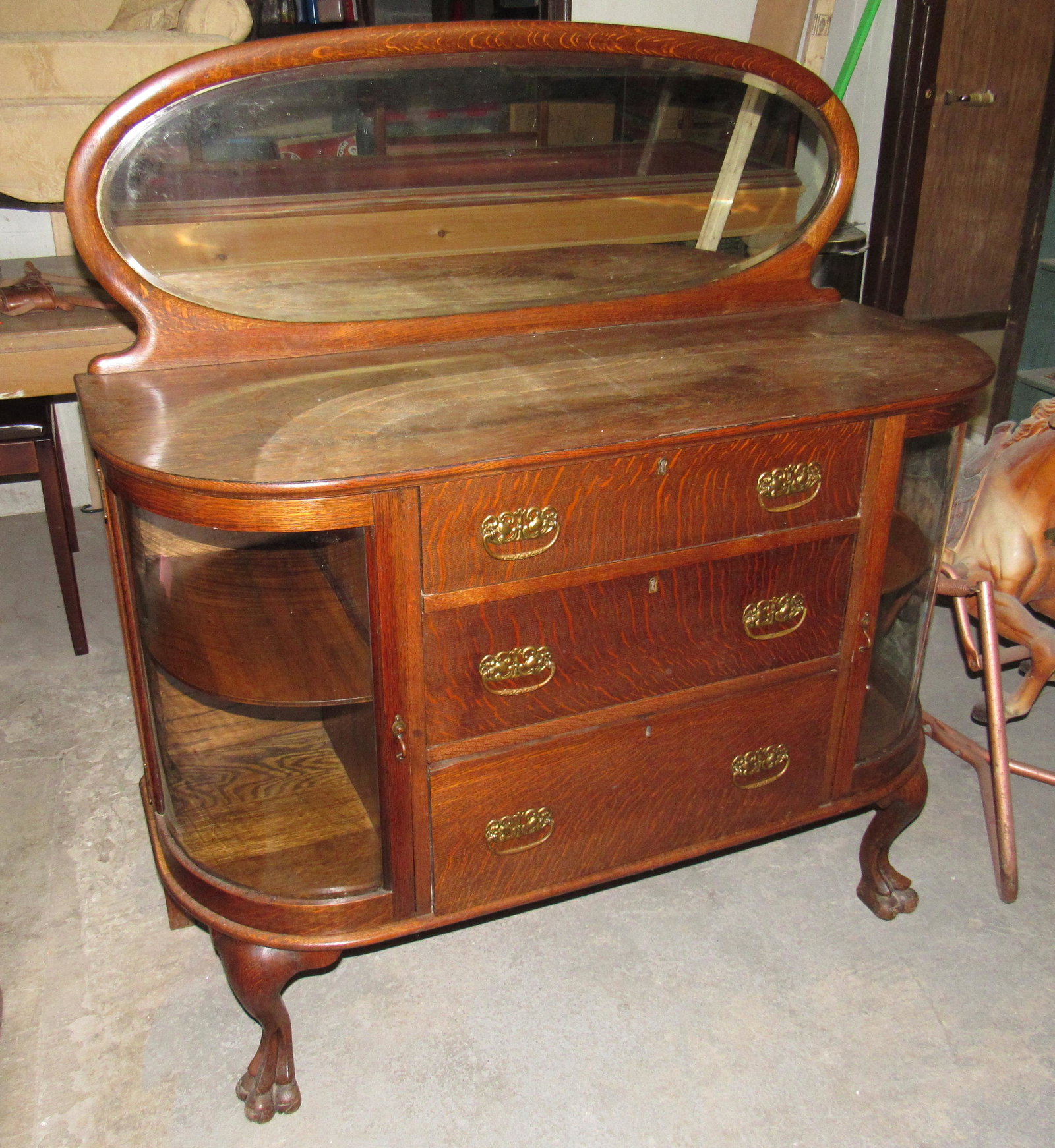 Oak Sideboard with Bowed Glass: Approx 20" x 48" x 52 1/2" tall.