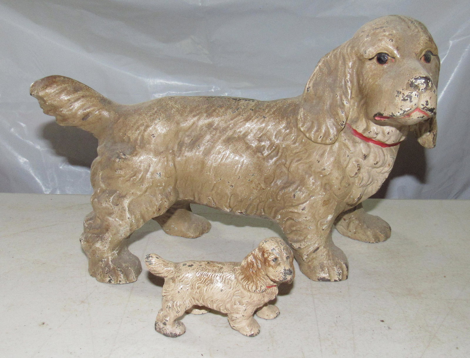 Cast Iron Dog Doorstop and Miniature: Door Stop is apprx 11" long and 7 1/2" tall