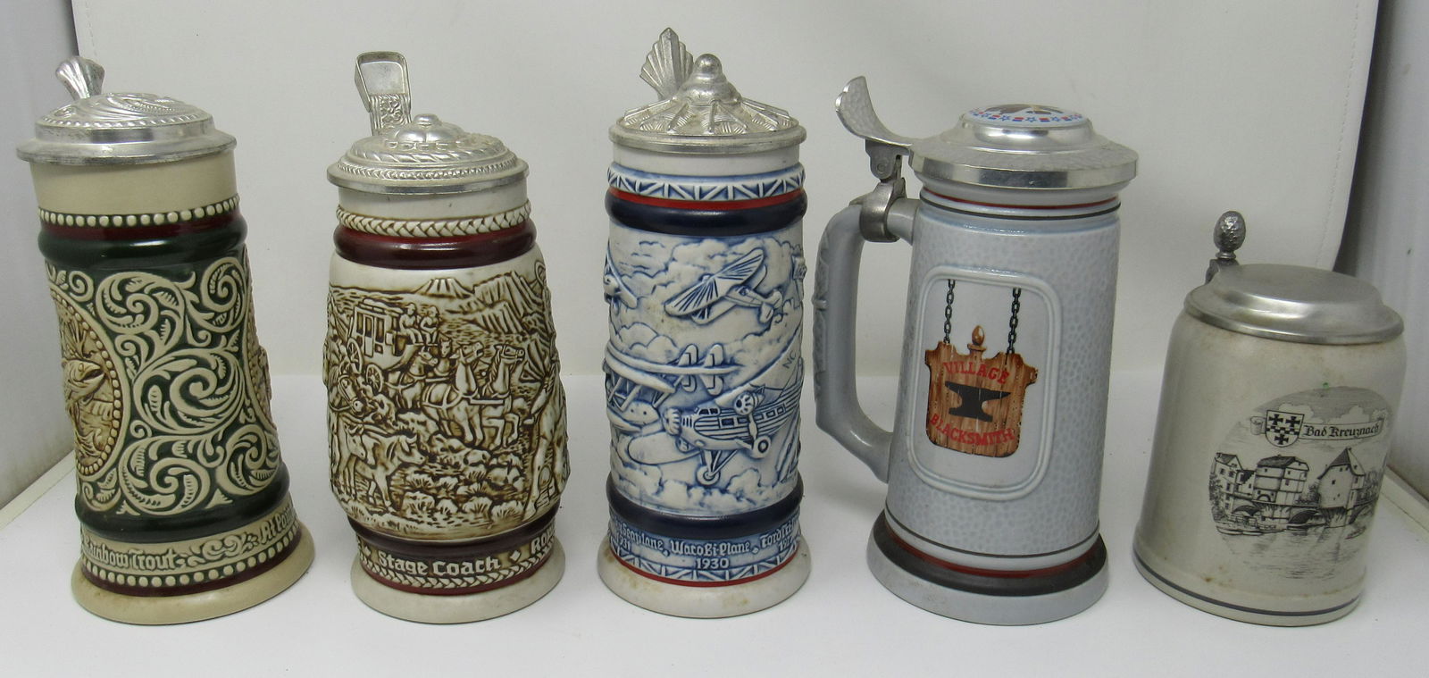 Avon Rainbow Trout Stage Coach Blacksmith Steins: Also included is Burgwindheim . Tallest is approx 9 3/4"