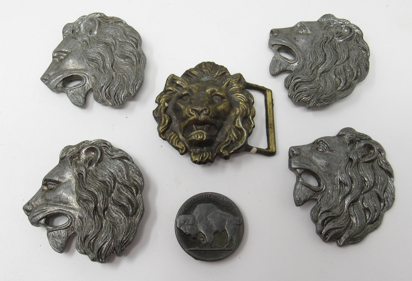 Lion Heads and Buffalo Nickel Style Belt Buckles: Lions heads are apprx 3 1/4" x 3"