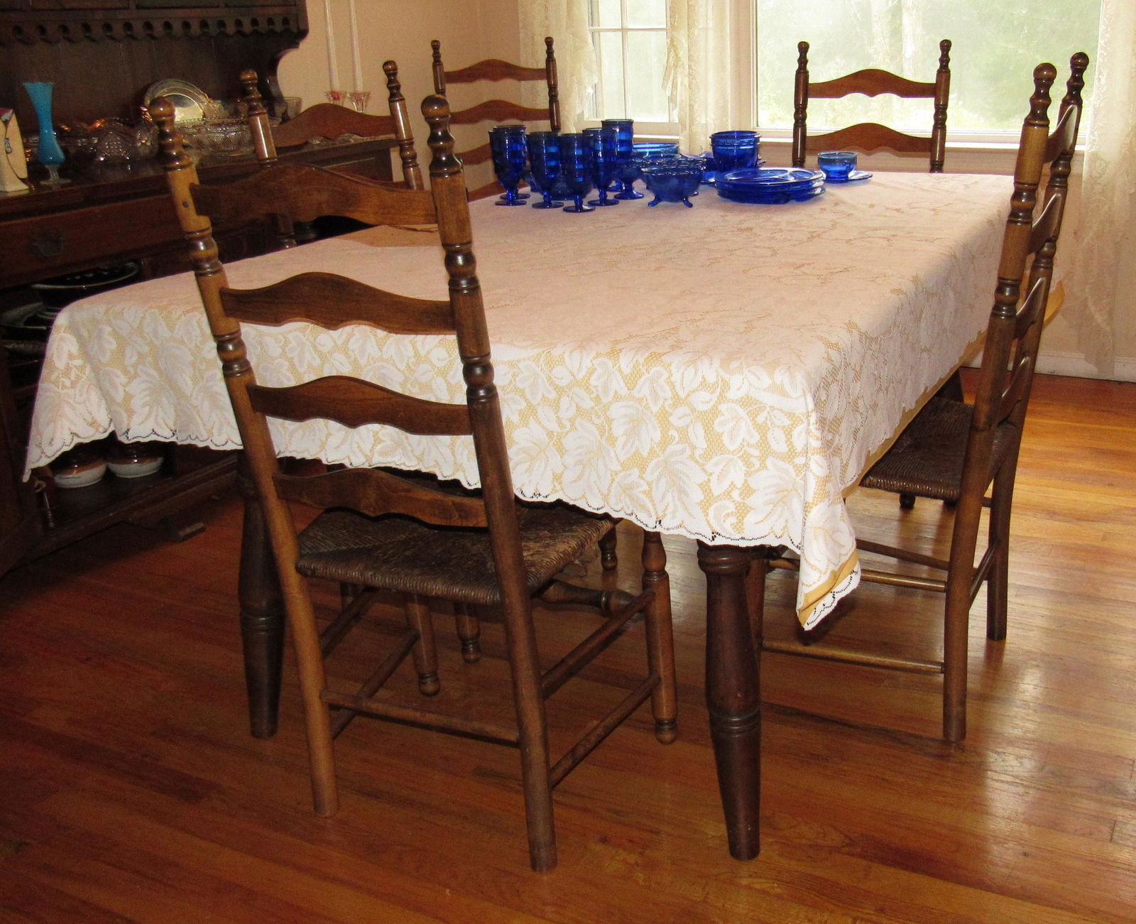 Pine Table with 6 Ladderback Chairs ( 2 Arm ): Table is approx 44" x 66" . Comes with 2 Extra leaves and table Pads. Does not include glassware on top