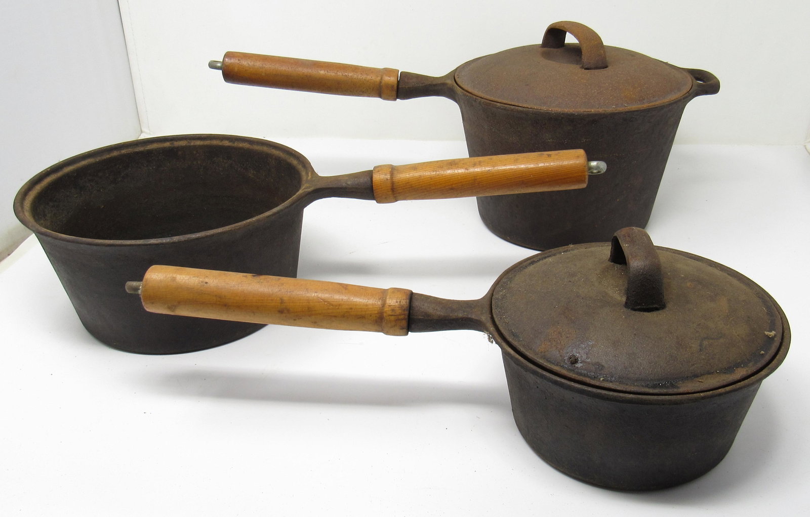 Cast Iron Sauce Pans: Largest is approx 8" in diameter and 5" tall. Made in Taiwan