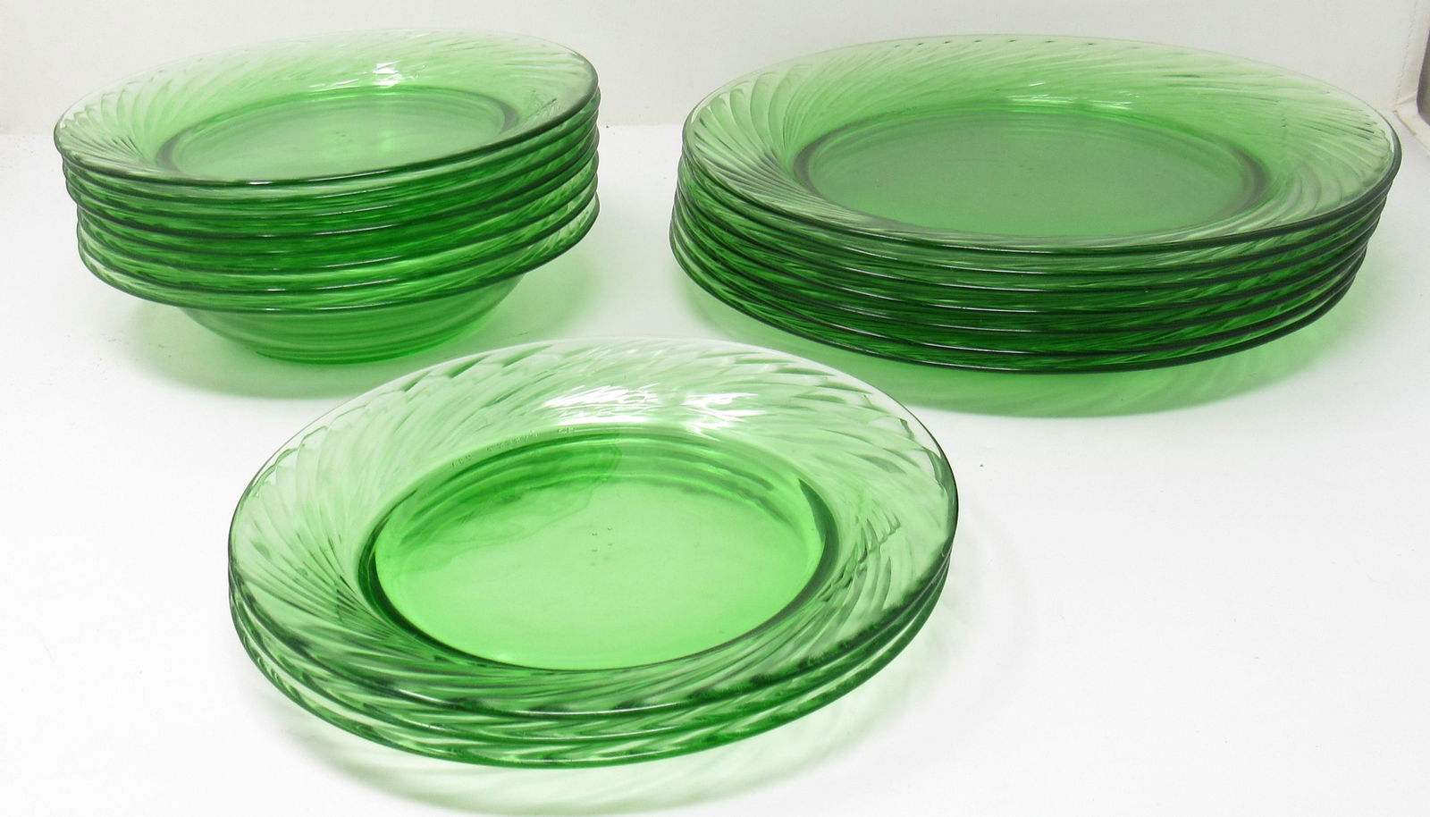 Pyrex Green Depression Swirl Plates: Largest are approx 10 7/8" in diameter