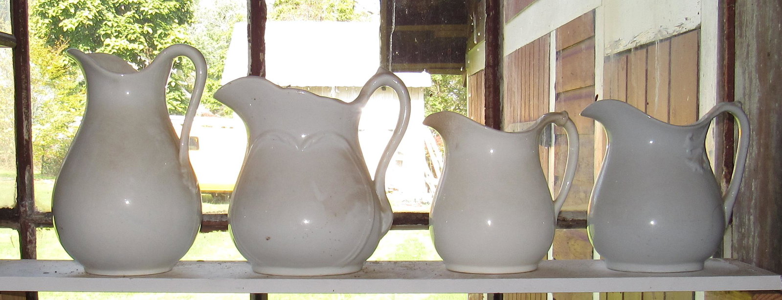 Ironstone Pitchers: Tallest is apprx 11 3/4" tall.