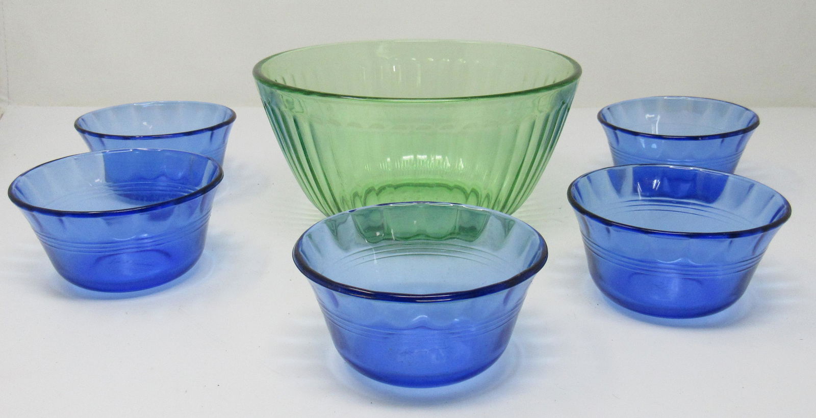 Green Pyrex Mixing Bowl & Blue Dessert Cups: Bowl is approx 7 1/4" in diameter and 3 1/2" tall