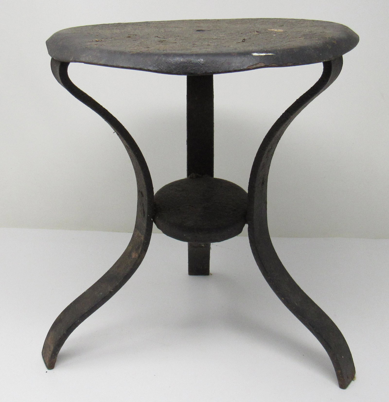 Iron Milk Stool: Approx 9 1/2" in diameter and 11 1/2" tall