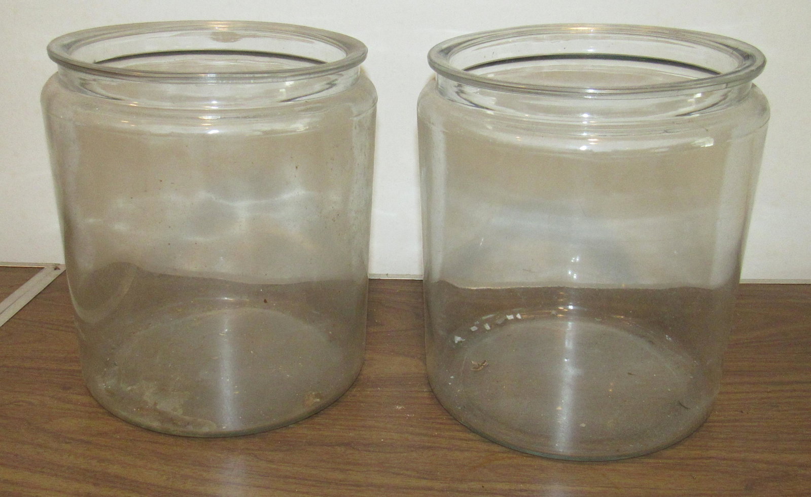 2 Glass Cookie Jars: Approx 9" in diameter and 10 1/2" tall.