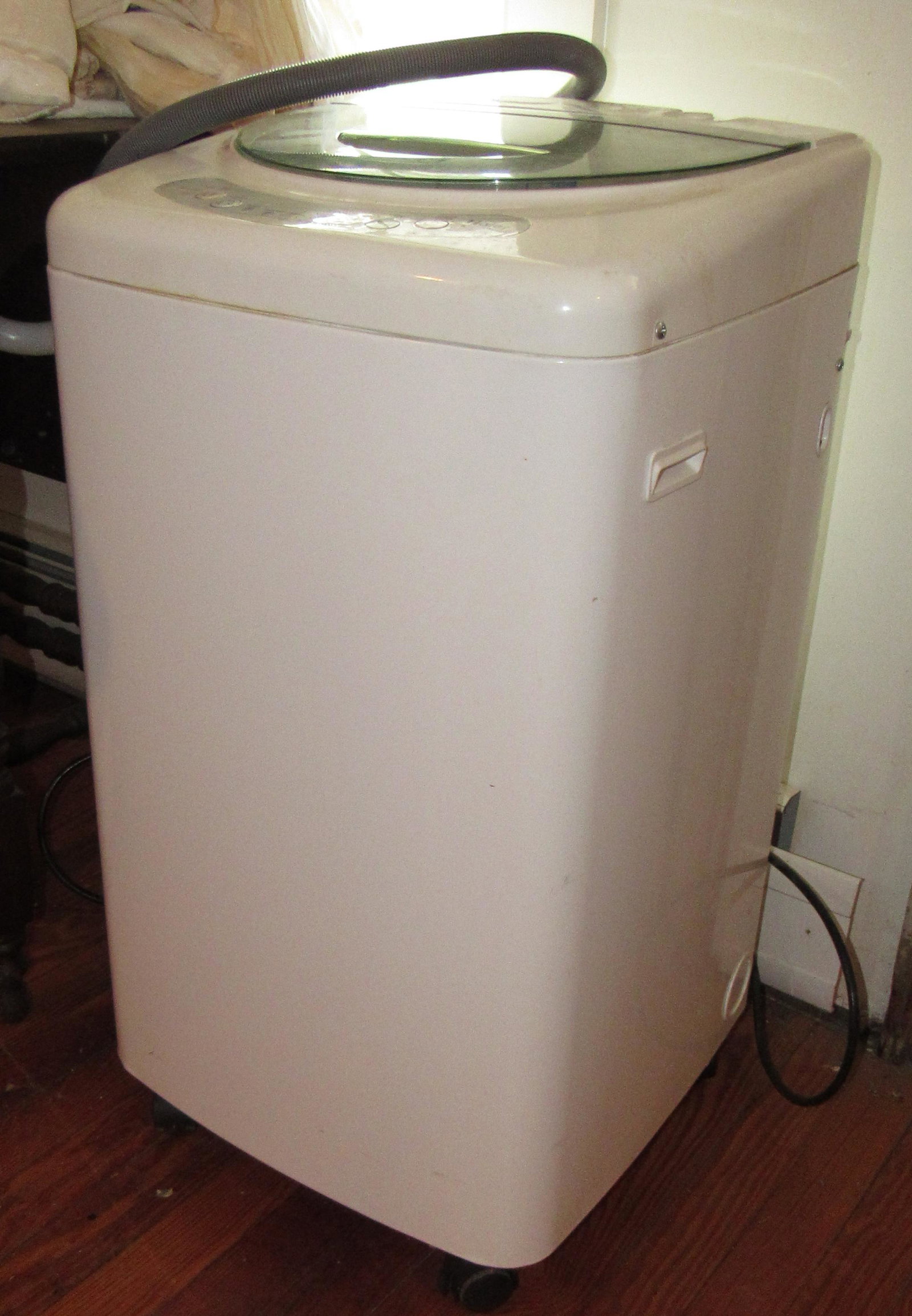 Haier Apartment Size Washing Machine: Approx 16" x 16" x 31 1/2" tall.