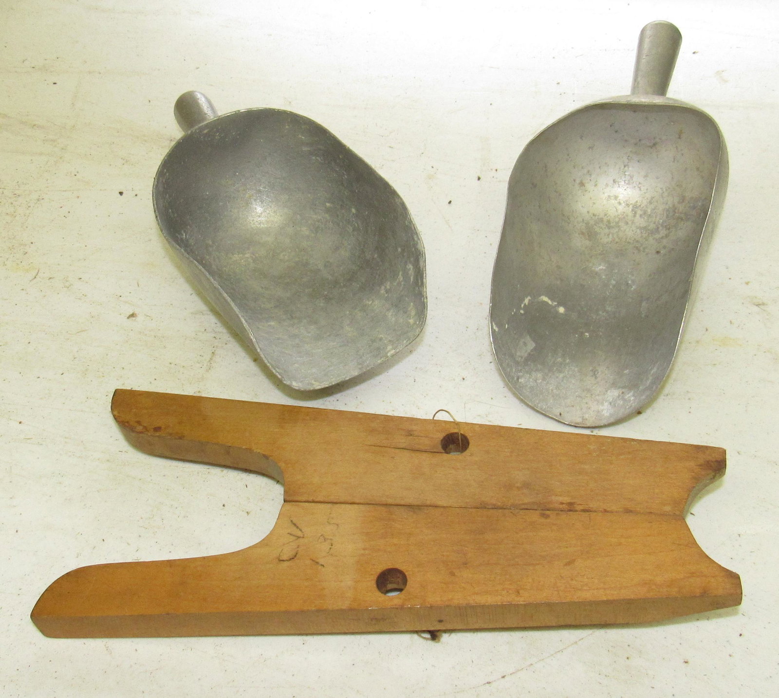 Aluminum Feed Scoops & Folding Boot Jack: Boot jack is approx 5" x 12"