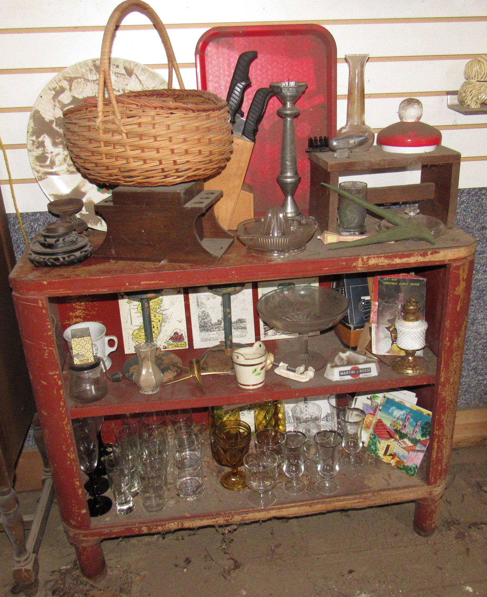 Shelf and Contents: Lot includes shelf and contents ( No items that are on shelves attached to wall). Take what you want and leave the rest