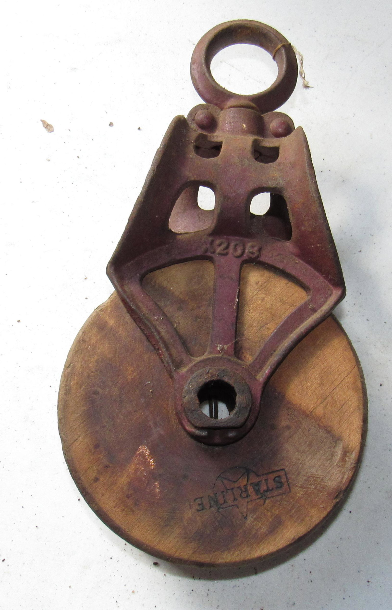 Starline Wooden and Cast Pulley: Wheel is approx 5 3/4" in diameter. Total length is approx 11"