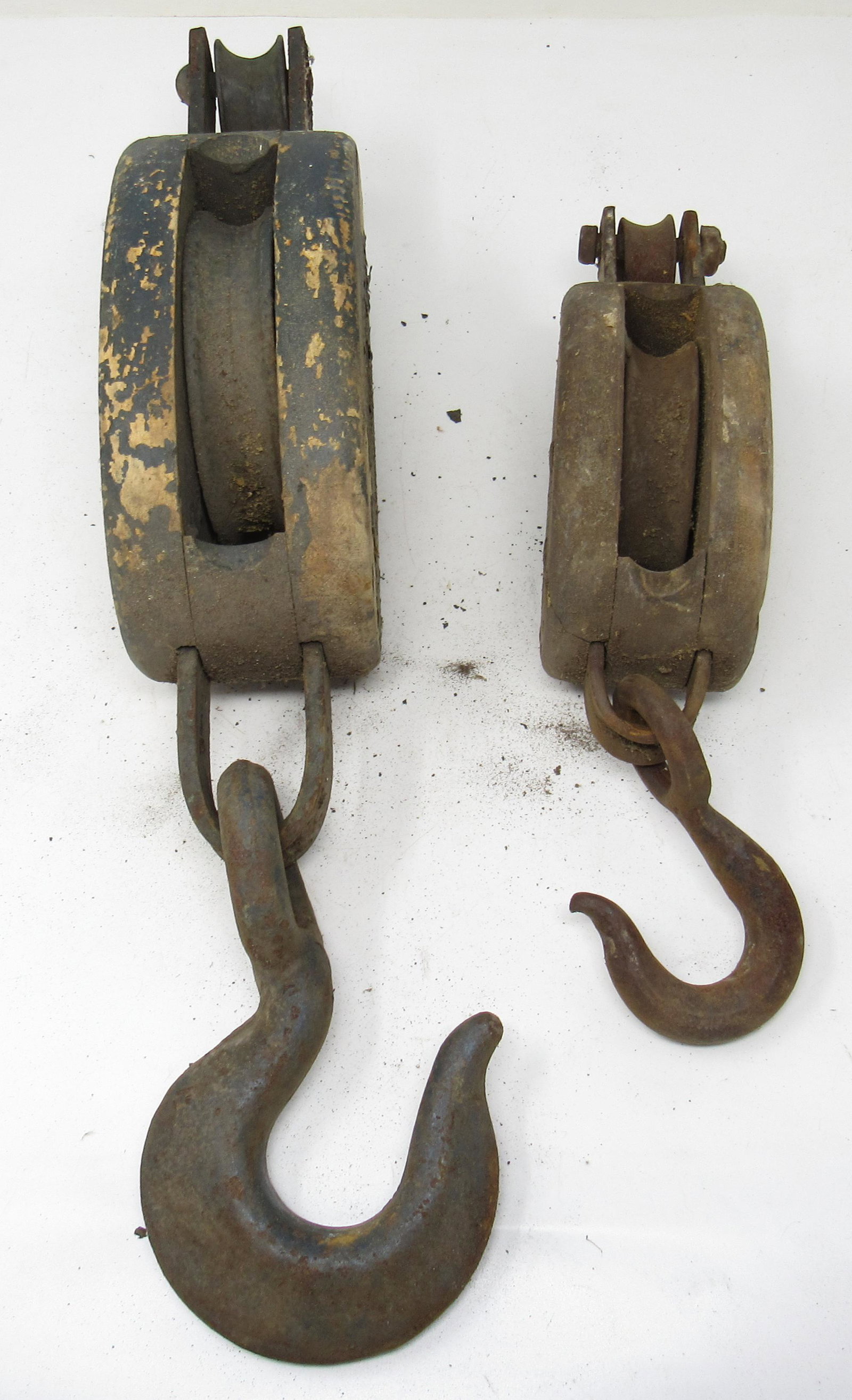 2 Wooden Pulleys: Largest is apprx 5 1/4" wide and 19 1/4" in total length