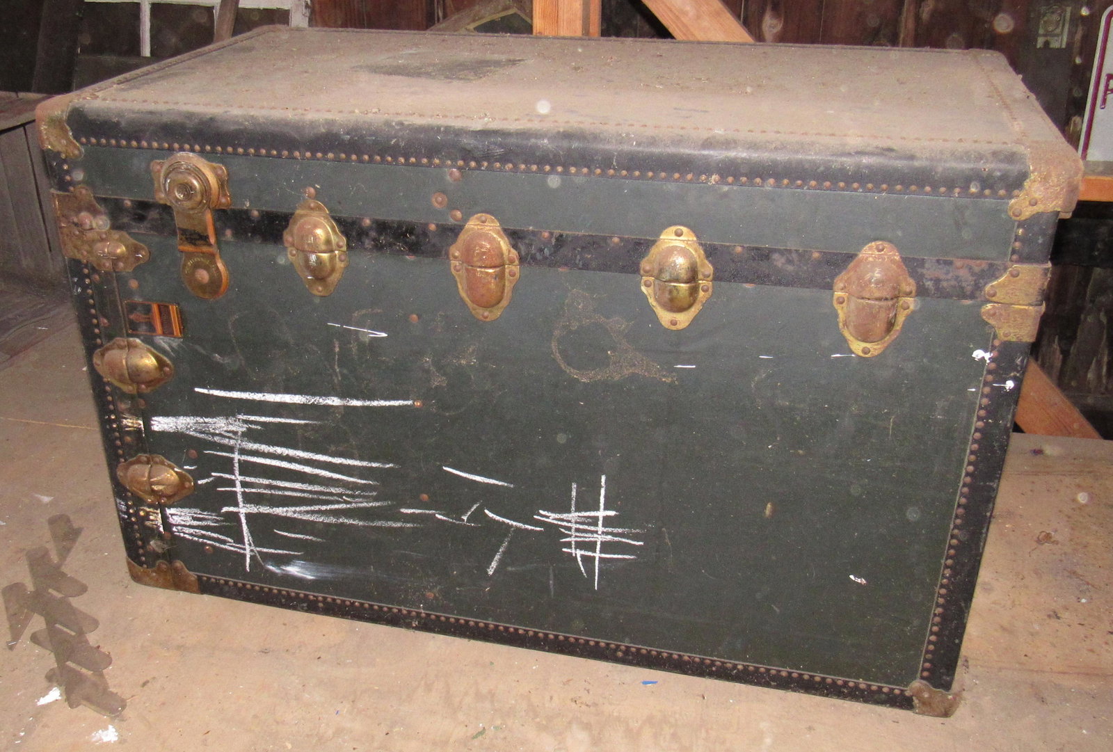 Oshkosh Trunk: Approx 22" x 25 1/2" x 42 1/2" . Believe to be a wardrobe trunk. We can not get it open