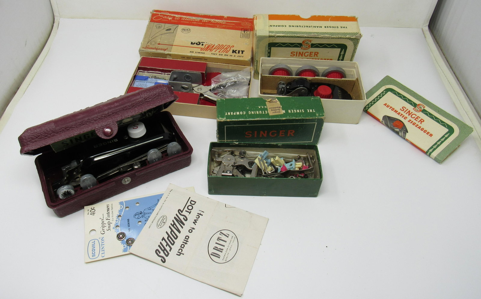 Singer Zigzagger Buttonholer Attachements: Also includes a Britz Dot Snappers Kit.