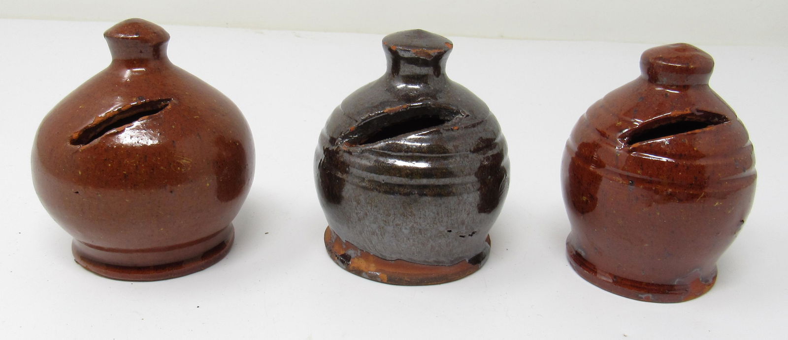 3 Redware Banks: Approx 3 1/8" tall and 2 5/8" in diameter.