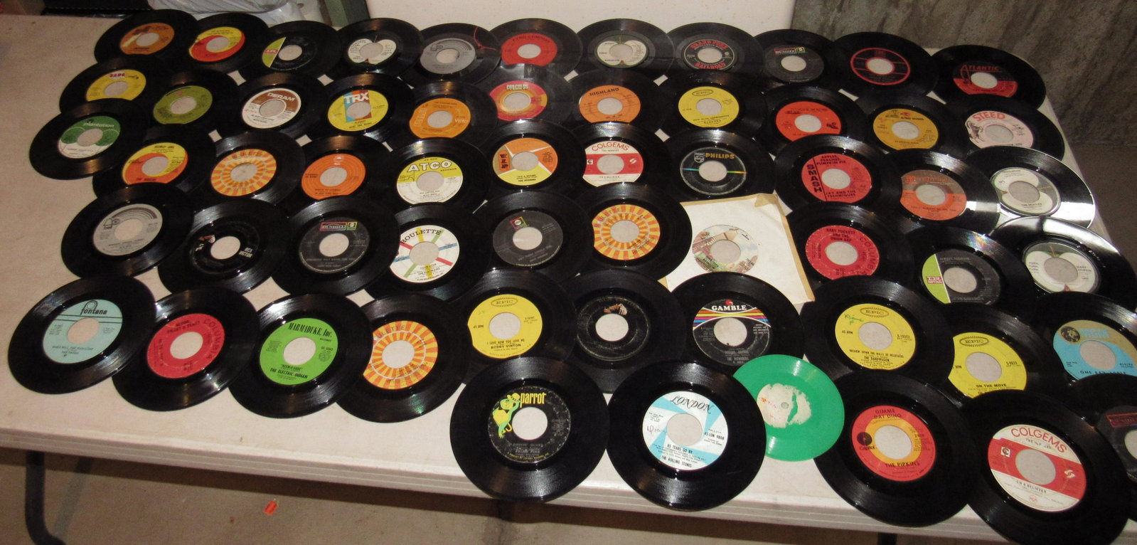 Beatles Monkees Rolling Stones and Misc 45 Records: Getting all pictured