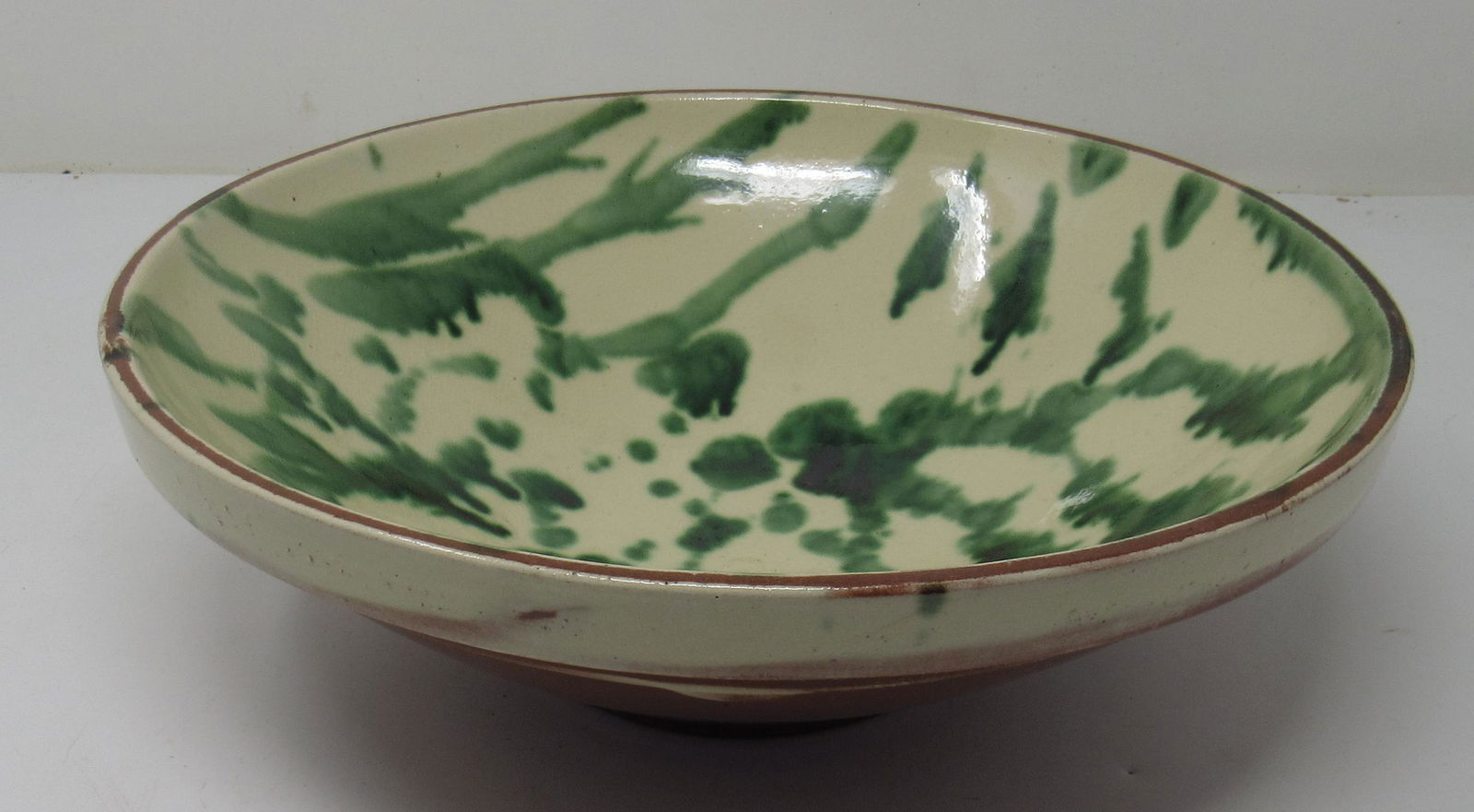 Glazed Redware Mixing Bowl: Approx 11" in diameter and 3 1/2" tall